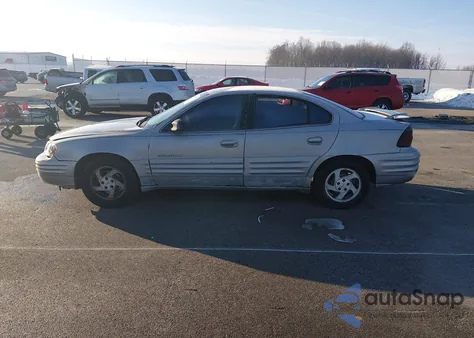 1999 Pontiac Grand Am Se1 z USA, uszkodzony, nr VIN 1G2NE52E3XC561206